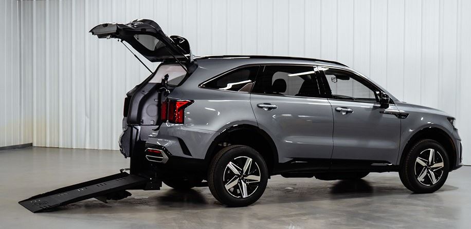 FMI Conversions Kia Sorento with ramp deployed from rear hatch.
