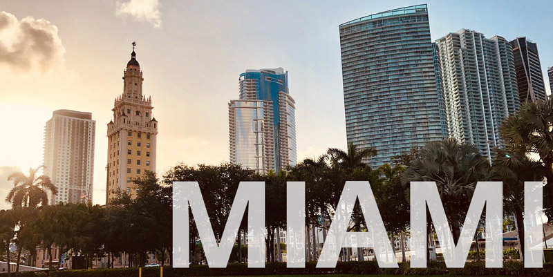 wheelchair accessible travel to Miami Miami at Sunset reads MIAMI and shows wheelchair accessible open city